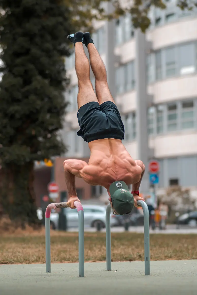 calisthenics coach demonstrating bodyweight skill training in Bondi calisthenics coach demonstrating bodyweight skill training in Bondi